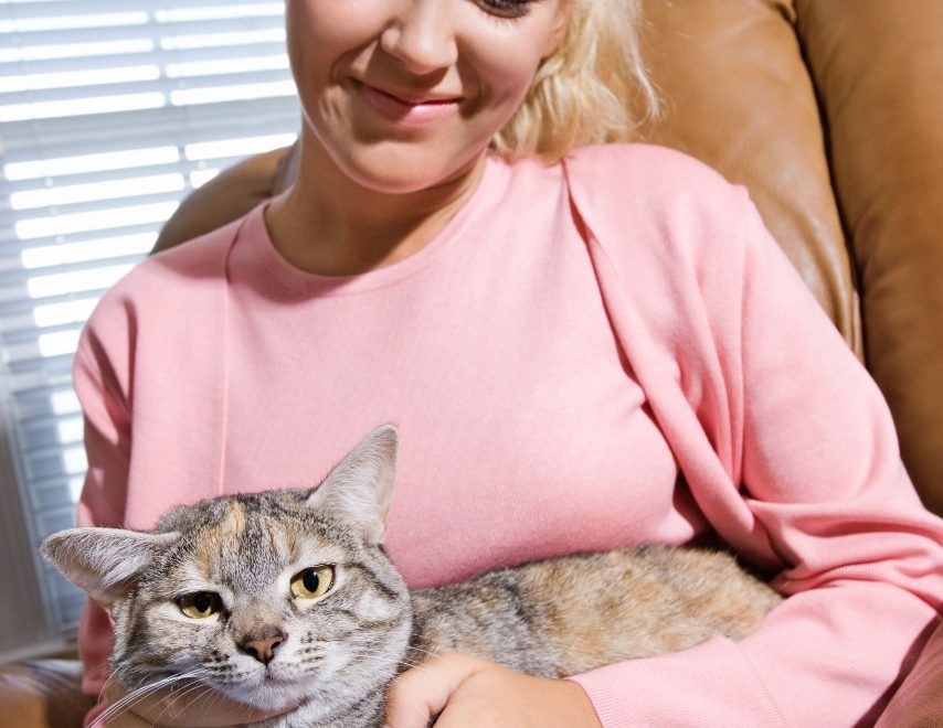 woman with pet cat